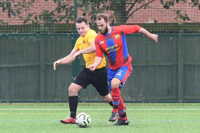 Northgate Olympic (red) v Kirton Reserves (yellow). Chris Hipkiss (red), Jack Reeson (yellow)