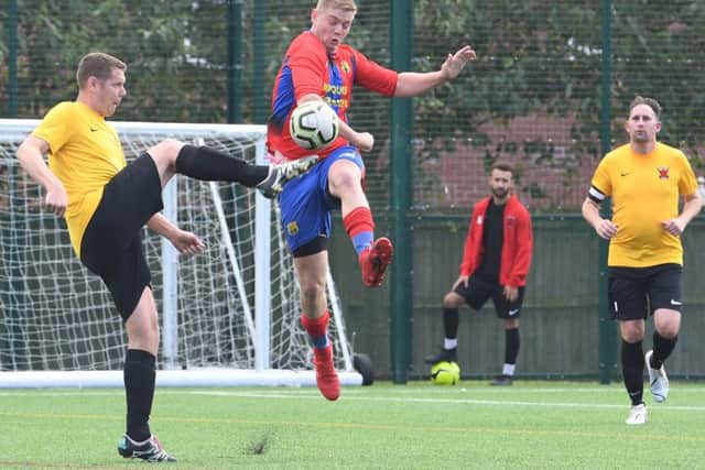 Northgate Olympic (red) v Kirton Reserves (yellow). Kenny Smith (red), Martin Durrant (yellow)