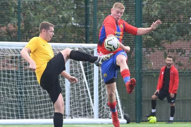Northgate Olympic (red) v Kirton Reserves (yellow). Kenny Smith (red), Martin Durrant (yellow)