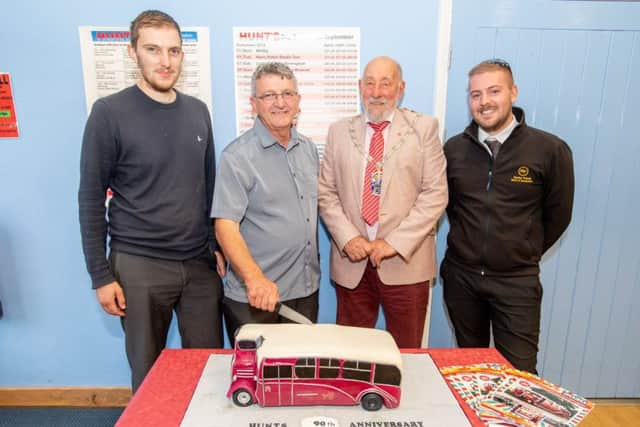 Directors Joe Hunt and Michael Hunt (the grandson and son of founder Michael Hunt), alongside the Mayor of Alford Grant Allen and tour driver Ben Abbott.