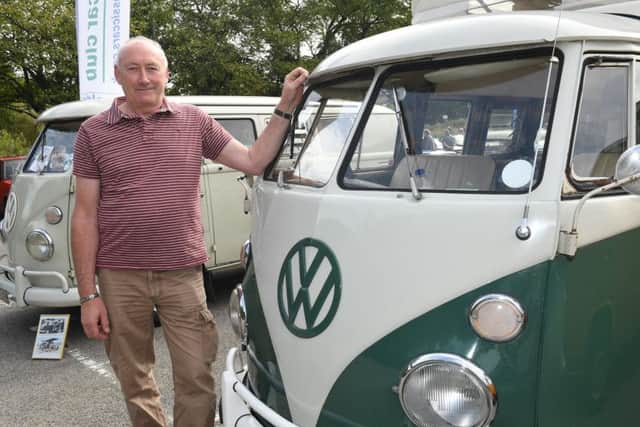Sleaford historic car and motorcycle show. Nigel Collier with his 1967 VW Devon Spaceway camper. EMN-190909-171511001