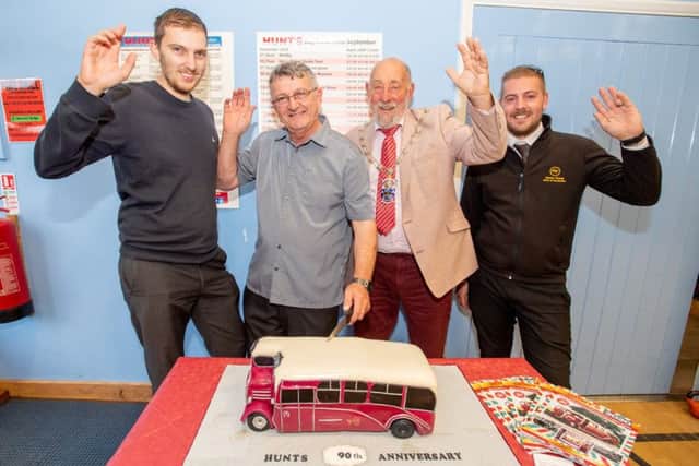 Directors Joe Hunt and Michael Hunt (the grandson and son of founder Michael Hunt), alongside the Mayor of Alford Grant Allen and tour driver Ben Abbott.
