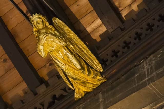 St Mary's Church angel, Horncastle. EMN-191009-161323001