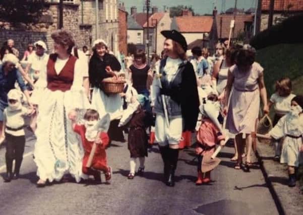 Cliff Carnival nostalgia - children and adults dressed up as fairy story characters in Navenby in the last carnival in 1980., EMN-190913-104755001