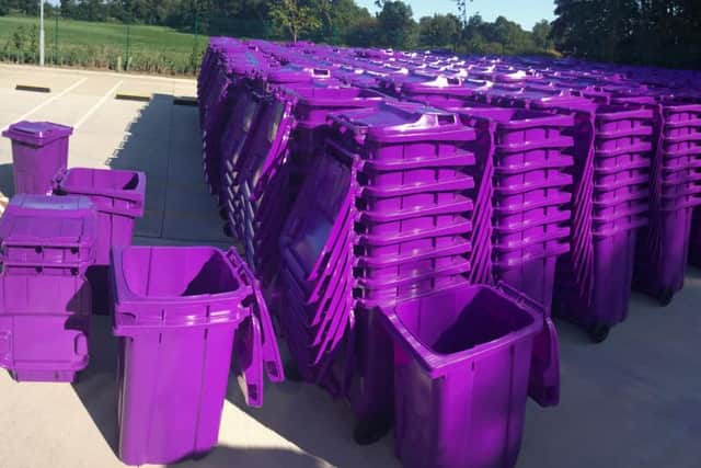 Hundreds of purple bins are being delivered to households in readiness for the new recycling trial.