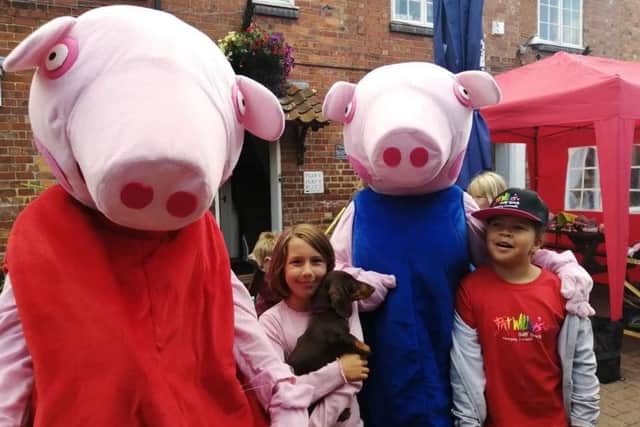 Peppa Pig characters were welcomed by youngsters at the Rainbow Stars fun day. EMN-190913-172732001