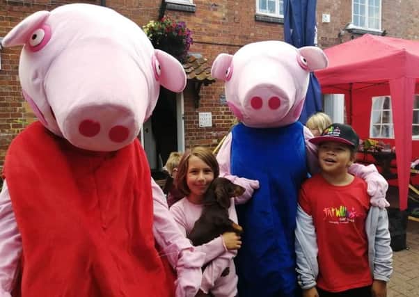 Peppa Pig characters were welcomed by youngsters at the Rainbow Stars fun day. EMN-190913-172732001