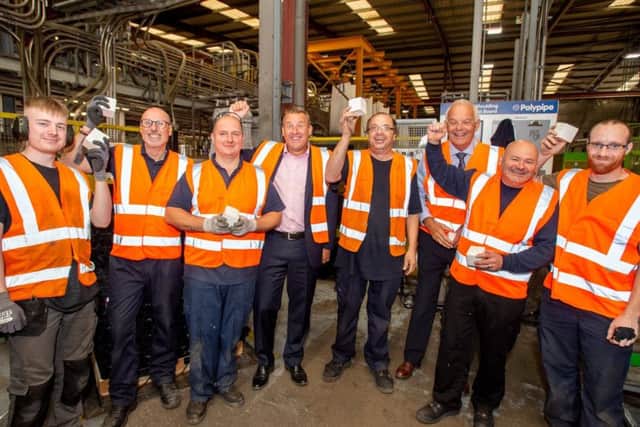 All smiles: Management and staff celebrate the 40th anniversary of Polpypipe in Horncastle - and confirmations that the site faces a very positive future