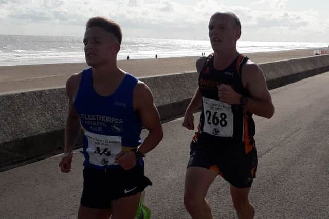 Jordan Carlisle (left) and Mark Sands matched each other stride for stride right to the finish EMN-191209-132234002