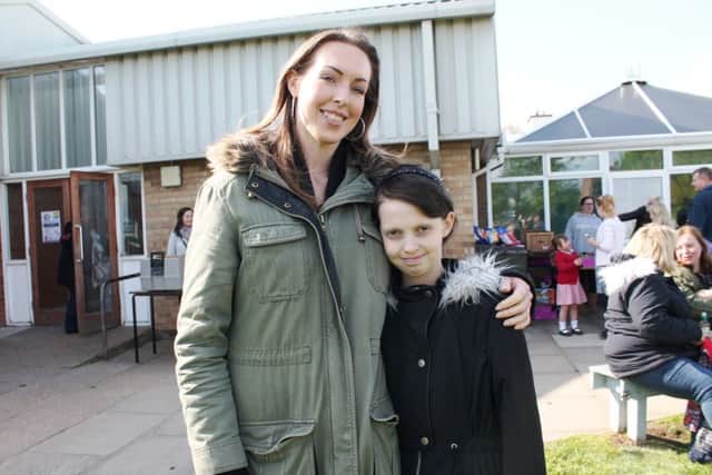 Demi Knight with her mum, Mel.
