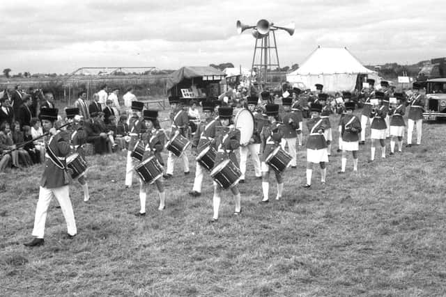 The Toy Soldiers' Carnival Band. They had an average age of 13 and performed for the royal family just a few months earlier.