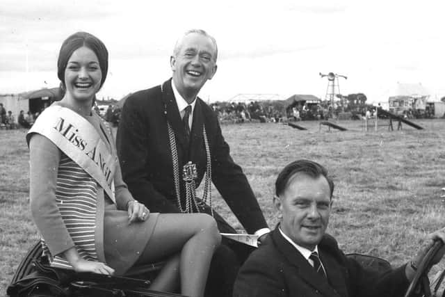 Miss Anglia, Grace Morgan, 22, with the Mayor and Dennis Vamplew in his vintage Aston Martin, after opening the gala.