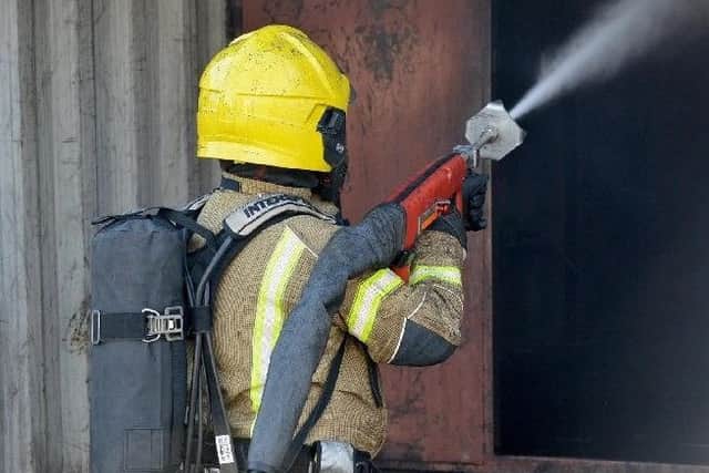Firefighters showed off the new 'Coldcut Cobra' hose jet, capable of penetrating walls.