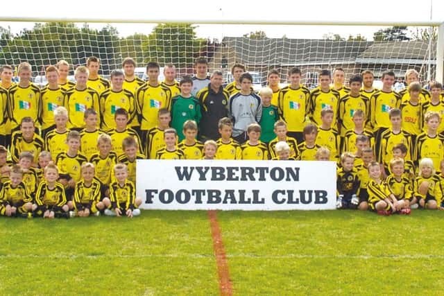 Wyberton football club with their new kits.