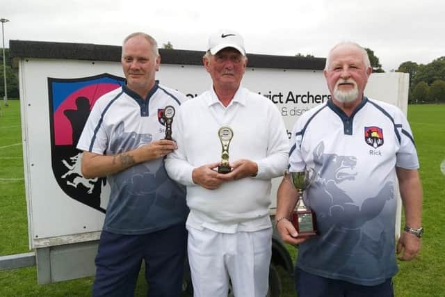 Bronze medallist Stuart Rodgers (left, and double national champion Pete Shaw with their coach and national award-winner Rick Smith (right) EMN-190919-095637002