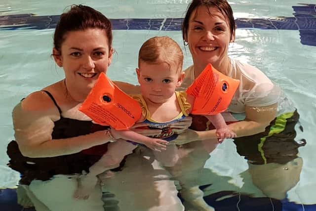 Maisey with her mum Rebecca and instructor Donna Smith.