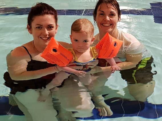 Maisey with her mum Rebecca and instructor Donna Smith.