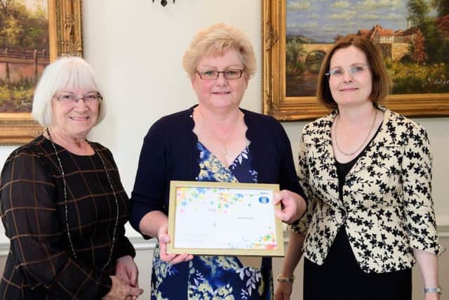 Lincolnshire Co-op vice president Margaret Tranter, left, and chief executive Ursula Lidbetter present a long service award to Pearl WatermanPicture: Chris Vaughan Photography for Lincolnshire Co-opDate: September 12, 2019 EMN-190920-065750001