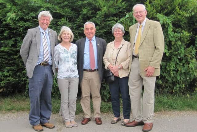 From left: Rotary President Jo Bowman, Liz Bell, Chris Dowse, Chris Dowse and Rtn Eric Bell EMN-190920-145601001
