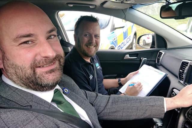 Lincolnshire PCC Marc Jones with IAM Roadsmart volunteer observer Richard Hardesty.