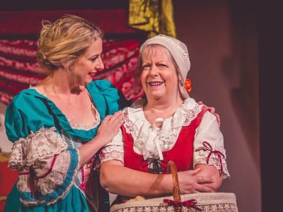 Nell and Nancy share a scene in this brilliant show at Sleaford Little Theatre. Photo: Sleaford Little Theatre.