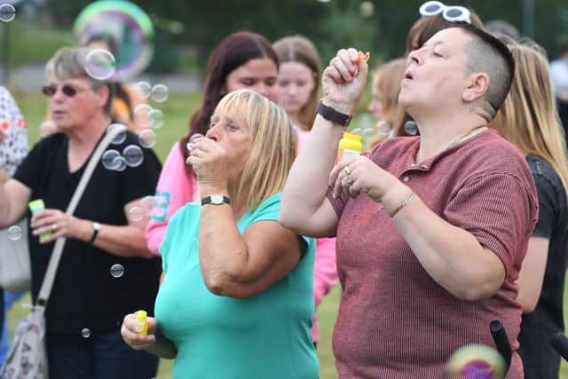 Demi Knight bubble release on Lacey Garden Junior Academy field.