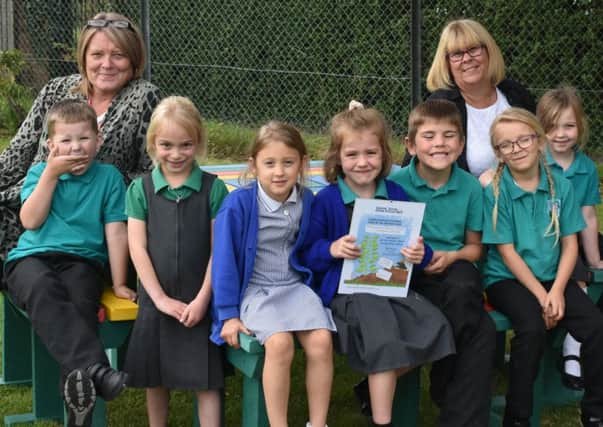 Proud pupils with their spudtastic certificate
