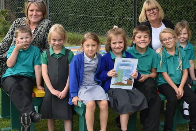 Proud pupils with their spudtastic certificate