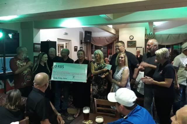Crew members together with members of the Anderby Creek Community Charity, The Creek Tavern and Springs Holiday Estates.