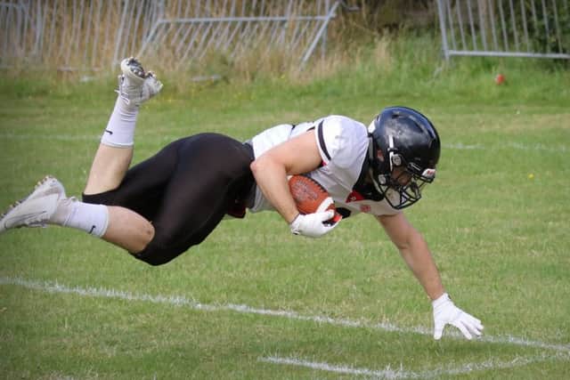 Harvey Elliott dives for a touchdown EMN-190927-105221002