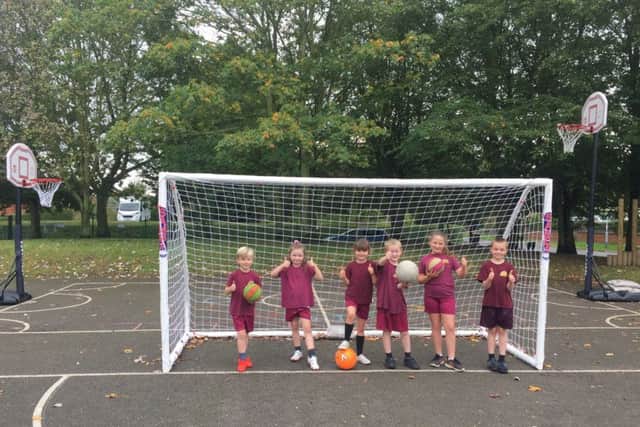 Pupils at Kelsey Primary School are giving the thumbs up to their new sports equipment EMN-190610-135831001