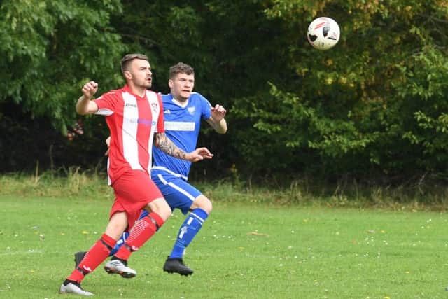 Boston Town Res (blue) v Horncastle Town Res (red). Roy Descobey (blue)