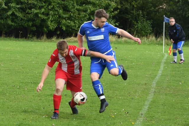 Boston Town Res (blue) v Horncastle Town Res (red). Dean Granger (blue), Will Burton (red).