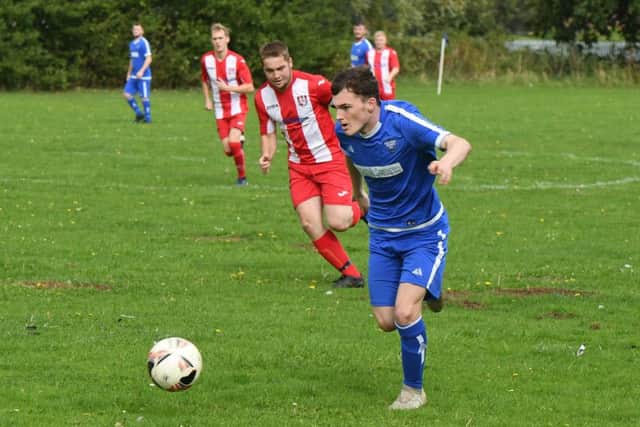 Boston Town Res (blue) v Horncastle Town Res (red). Kyle Tate (blue), Will Burton (red).