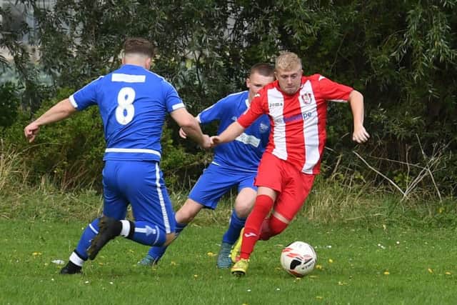 Boston Town Res (blue) v Horncastle Town Res (red). Dean Granger (blue), Damian Gibson (red).