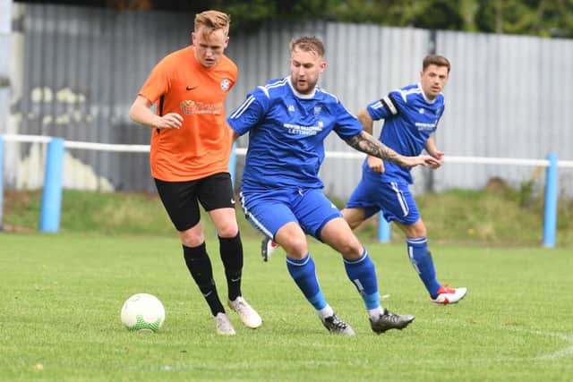 Boston Town v Lutterworth football action.