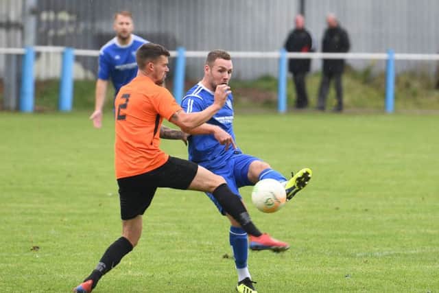 Boston Town v Lutterworth football action.