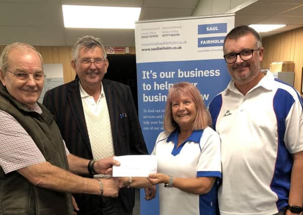 Organiser David Turner with winners John Scholey, Jayne Taplin and Keith Taplin.