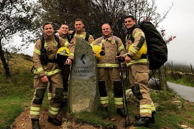 The team pictured at the base of the mountain before their climb. From left: Charlie, Ollie, Ben, Sam and Daniel Images supplied.