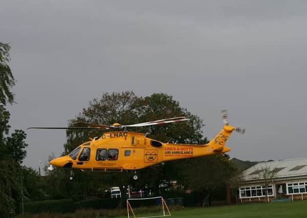 The air ambulance landing on the school grounds this morning. (Credit: Wayne J. Bateman)