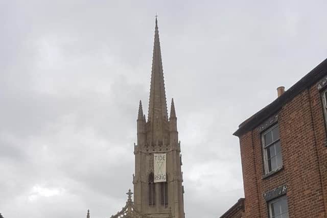 The Extinction Rebellion banner at St James' Church, Louth.