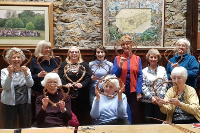 Tealby WI members had fun making heart wreaths EMN-191013-181702001