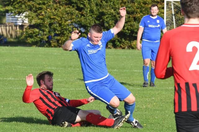 Benington (blue) v Woodhall Spa Res (red). Lewis Skinner (blue), Chris Hall (red)