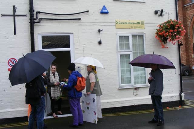 Extinction Rebellion campaigners pay a visit to MP Caroline Johnson's Sleaford office on Monday morning. EMN-190810-180503001