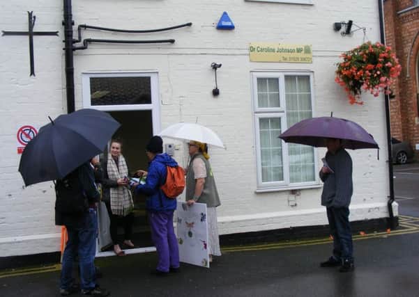 Extinction Rebellion campaigners pay a visit to MP Caroline Johnson's Sleaford office on Monday morning. EMN-190810-180503001