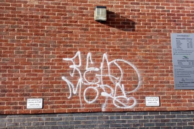 Graffiti on the wall of the towns library