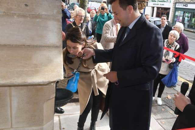 The Marquis and Marchioness of Bristol take the first drink from the restored Bristol Water Fountain.