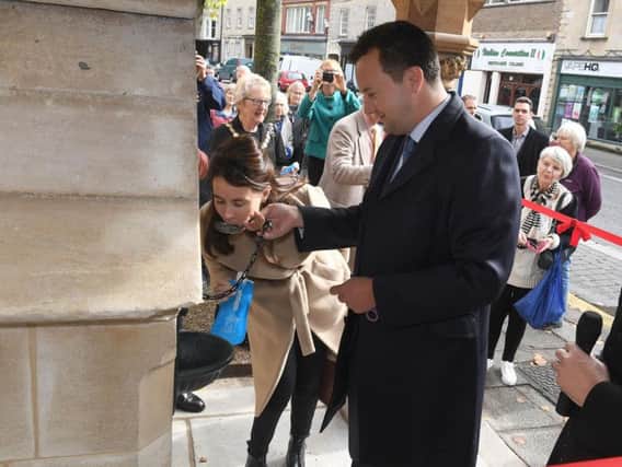 The Marquis and Marchioness of Bristol take the first drink from the restored Bristol Water Fountain.