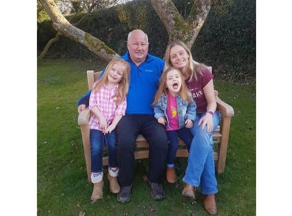 Hannah Mackay with her father and children.