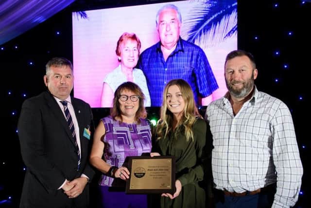 Leader of NKDC Coun Richard Wright, with special award recipients Wendy, Abbie and Stephen Coy of South Kyme.